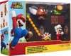 The image shows a Super Mario Lava Castle Diorama Set in its retail packaging. The packaging features a large illustration of Mario on the left and a clear plastic window displaying the included figures and accessories on the right. The background of the p Produktbild-Vorschau
