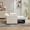 A beige sofa bed is shown in a living room setting, partially converted into a bed. A plant and a cabinet are visible in the background. Produktbild-Vorschau