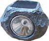 A solar-powered garden light designed to look like a rock. Produktbild-Vorschau