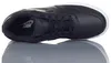 A top-down view of a black Nike sneaker with a white sole, resting on a reflective surface. Produktbild-Vorschau