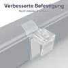 A close-up of a clear plastic clip attached to a gray window blind or roller shade. Produktbild-Vorschau