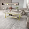 A modern living room scene with a couch and coffee table. Produktbild-Vorschau