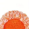 A close-up view of the texture of a mop head, showing orange and white fibers. Náhled obrázku produktu