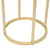Close-up of the base of a gold metal stand, likely for flowers or decorations. Podgląd zdjęcia produktu