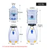A size chart showing two penguin-shaped water dispensers with dimensions and a water bottle. Produktbild-Vorschau