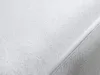 Close-up of a white mattress protector with a stitched seam. Produktbild-Vorschau