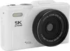 A white digital camera with a black lens is shown against a white background. Voir les images du produit