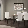 A dining room scene with a table and chairs. Náhled obrázku produktu