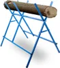 A blue folding sawhorse with a log on it, set against a white background. Produktbild-Vorschau