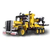 A yellow tow truck toy made of building blocks. Náhľad obrázku produktu