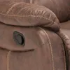 A close-up view of the side of a brown leather recliner chair, showing the handle mechanism for reclining. Anteprima dell’immagine prodotto