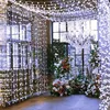 A room decorated with string lights and flowers for a party or event. Náhled obrázku produktu