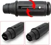 Close-up views of a black pressure washer gun connector, showing its mechanism and different states. Anteprima dell’immagine prodotto