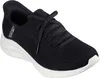 A black Skechers sneaker with a white sole is shown against a white background. Produktbild-Vorschau