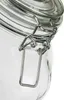 A close-up shot of the metal clasp and glass rim of a jar. Anteprima dell’immagine prodotto