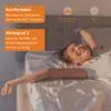 A woman is happily stretching on a bed, with marketing text overlays. Produktbild-Vorschau