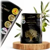 A black olive oil tin with gold accents and awards displayed on a wooden stand, with an olive branch in the background. Náhľad obrázku produktu