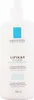 A white pump bottle of La Roche-Posay Lipikar Fluide. Podgląd zdjęcia produktu