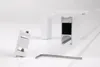 Product components for a curtain rail system, including a mounting bracket and a section of the rail, laid out on a white surface. Produktbild-Vorschau