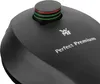 A close-up view of the top of a black pressure cooker lid with a dial and branding. Náhled obrázku produktu