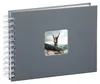 A gray spiral-bound photo album with a small window on the cover showing a person with arms raised on a mountain. Produktbild-Vorschau