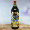 A bottle of Glühwein with a festive label, set against a soft, blurred background of snow and lights. Náhled obrázku produktu