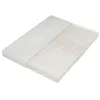 A white mattress with a textured surface and a partial white cover. Produktbild-Vorschau