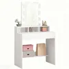 A white vanity table with a lighted mirror and makeup accessories. Náhled obrázku produktu
