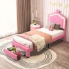 A child's pink bed with LED lights and storage drawers, set in a bedroom. Voir les images du produit