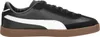 A side view of a single black Puma shoe with a white stripe and a brown sole, presented on a white background. Voir les images du produit