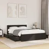 A bedroom scene with a bed and artwork on the wall. Náhled obrázku produktu