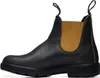 A side view of a brown leather Blundstone boot with mustard elastic. Voir les images du produit