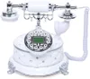 A vintage-style landline telephone with a decorative base. Náhled obrázku produktu