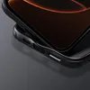 A close-up shot of a black phone case on a dark gray surface. Náhled obrázku produktu