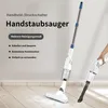 A hand holding a vacuum cleaner handle, with a vacuum cleaner on the floor in the foreground. Produktbild-Vorschau