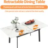 A retractable dining table with a marble-like finish is shown partially extended, with arrows indicating the movement. Decorative items like a plant and fruit are on the table. Produktbild-Vorschau