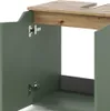 A close-up view of an open green cabinet with a wooden countertop. Voir les images du produit