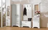 A white wardrobe, coat rack, and cabinet set in a hallway. Produktbild-Vorschau