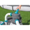 A hand is shown adjusting the valve on a pool filter system next to an above-ground swimming pool. Produktbild-Vorschau