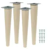 Four wooden furniture legs with metal top plates and a pile of screws, all against a white background.