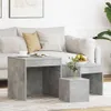 A living room scene with a sofa and nesting tables. Náhled obrázku produktu