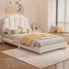 A bedroom scene with a white bed, pillows, and a yellow blanket. Produktbild-Vorschau