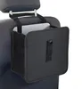 A black car trash can is hanging on the back of a car seat. Produktbild-Vorschau