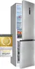A silver refrigerator with its door open, displaying food items inside. A marketing award badge is attached to the left side of the refrigerator. Produktbild-Vorschau