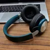 Headphones resting on a laptop. Podgląd zdjęcia produktu