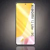 A smartphone with a yellow and pink abstract wallpaper displayed on its screen, set against a gradient gray background. Produktbild-Vorschau