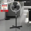 A standing fan is displayed in a room with a blurred background. Náhľad obrázku produktu