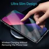 A hand is shown touching a smartphone that is placed on a wireless charger. The phone is encased in a protective case. Produktbild-Vorschau