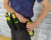 A person wearing a blue patterned shirt and a black belt with multiple bottle holders, holding a bottle. Produktbild-Vorschau