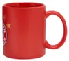 A red mug with the FC Bayern München logo and stars. Anteprima dell’immagine prodotto